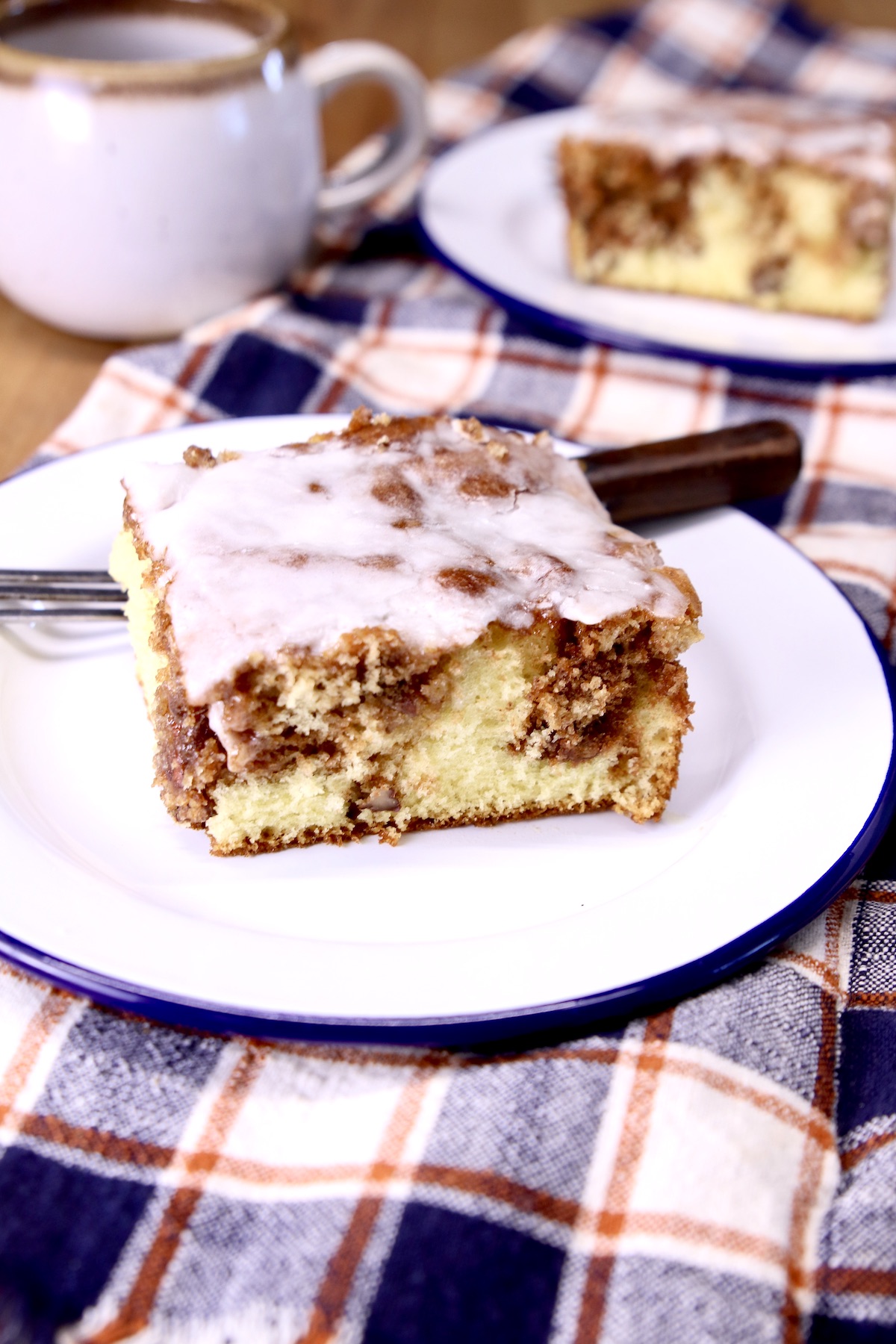 Cinnamon Coffee Cake on a saucer with a fork