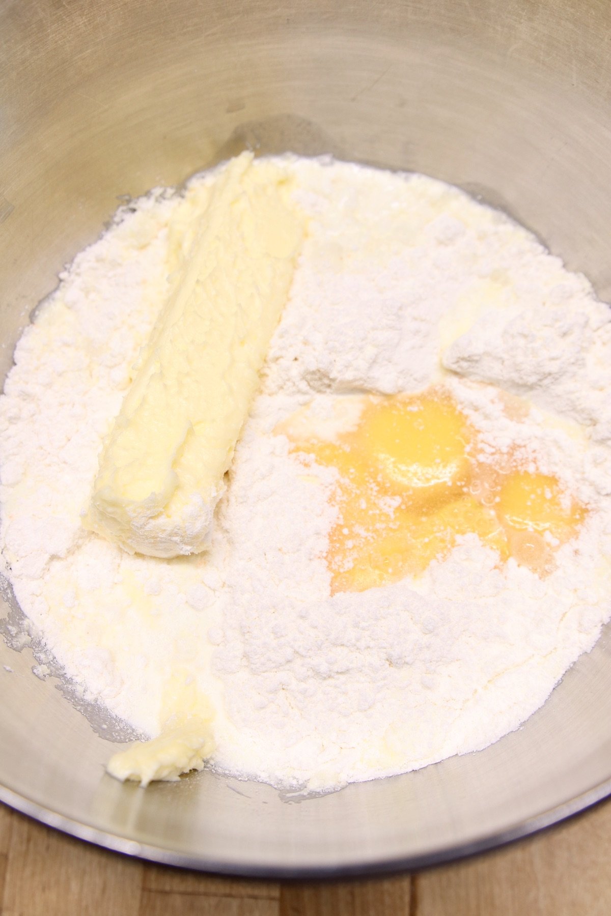 cake mix, butter, eggs and milk in a mixer bowl