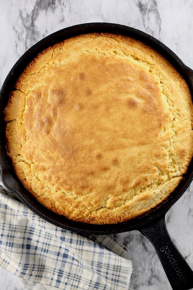 Buttery Skillet Cornbread baked in a cast iron skillet