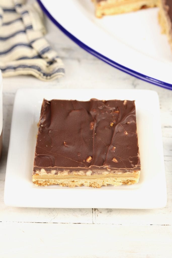 Chocolate Toffee Bars slice on a white plate