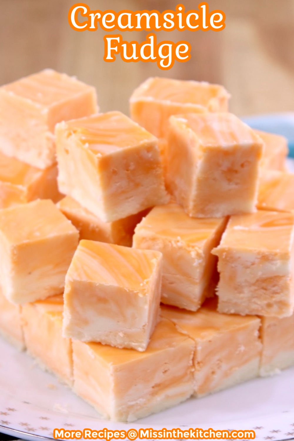 Creamsicle Fudge on a plate with text overlay