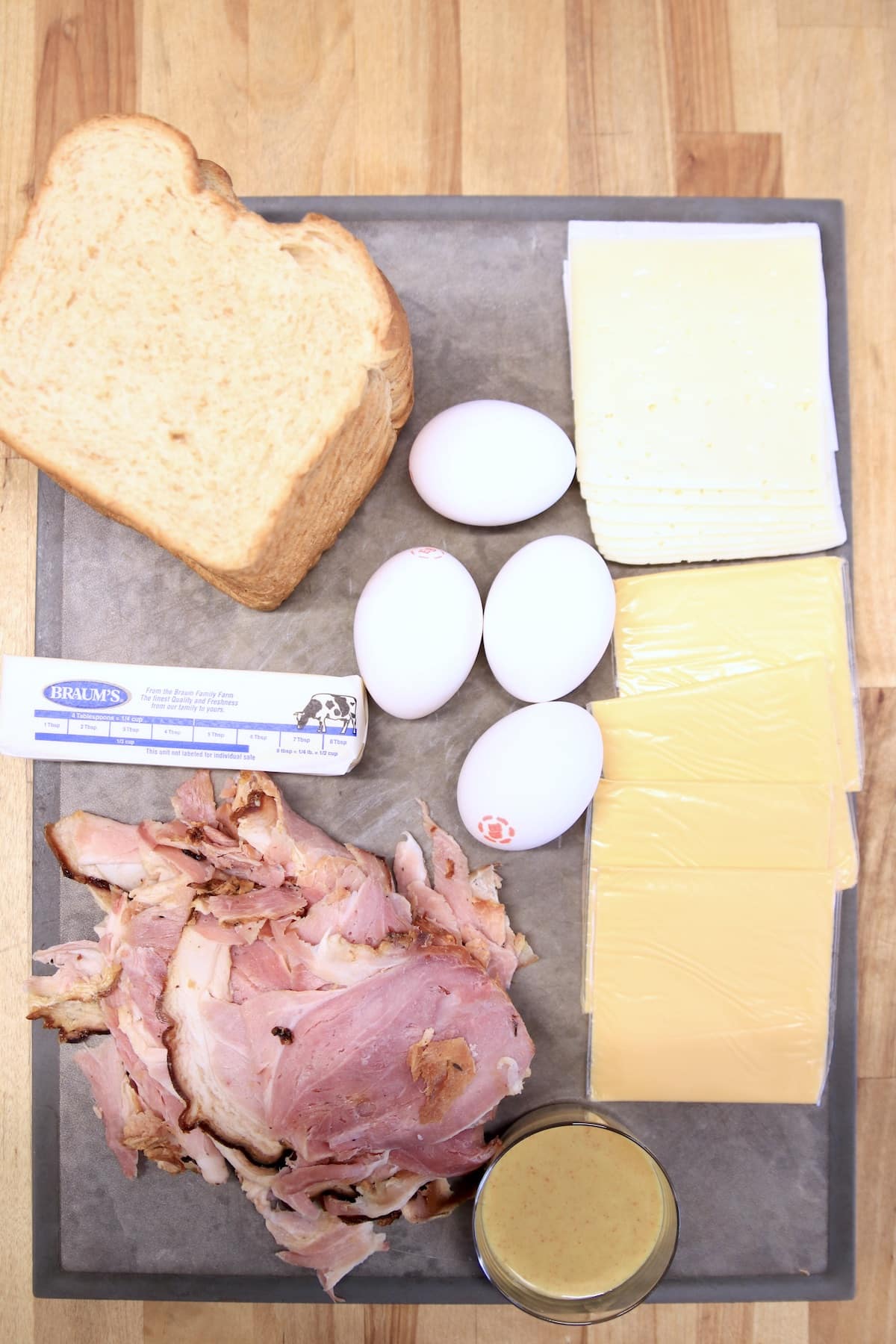 Ingredients for ham, egg and cheese sandwiches.