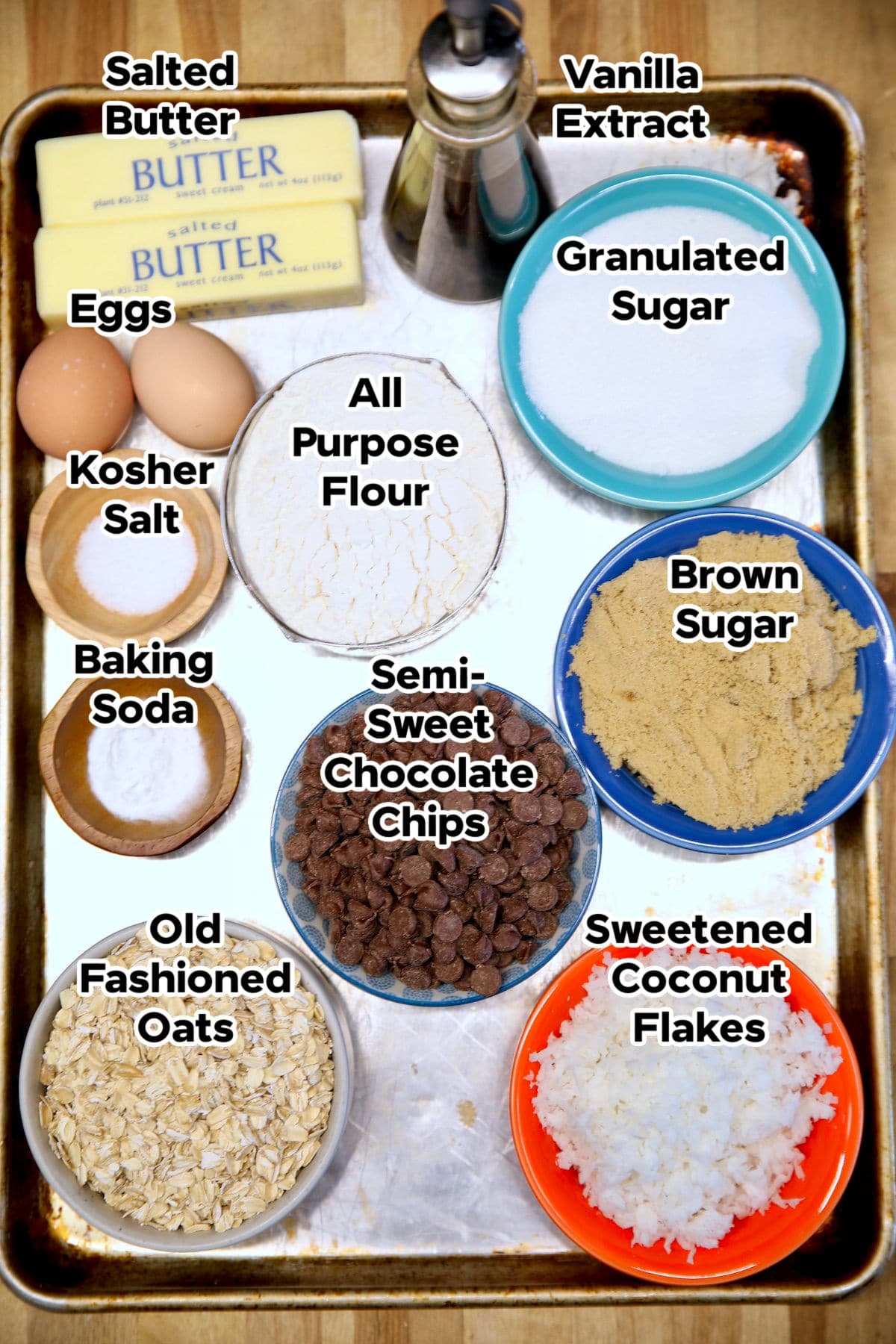 Ingredients with text for chocolate chip coconut cookies.