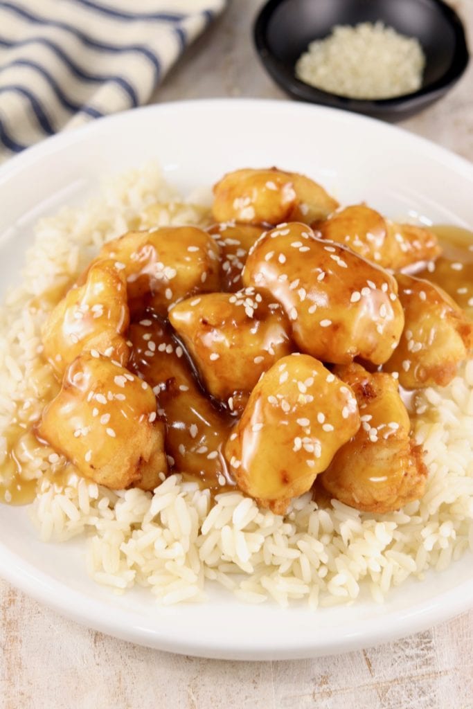 Bowl of rice topped with Sesame chicken