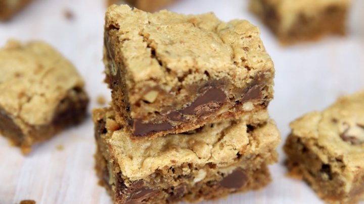 Chewy Chunky Blondies are a loaded cookie bar dessert with chunks of chocolate, walnuts and toffee bits. A rich and delicious treat that is totally irresistible.