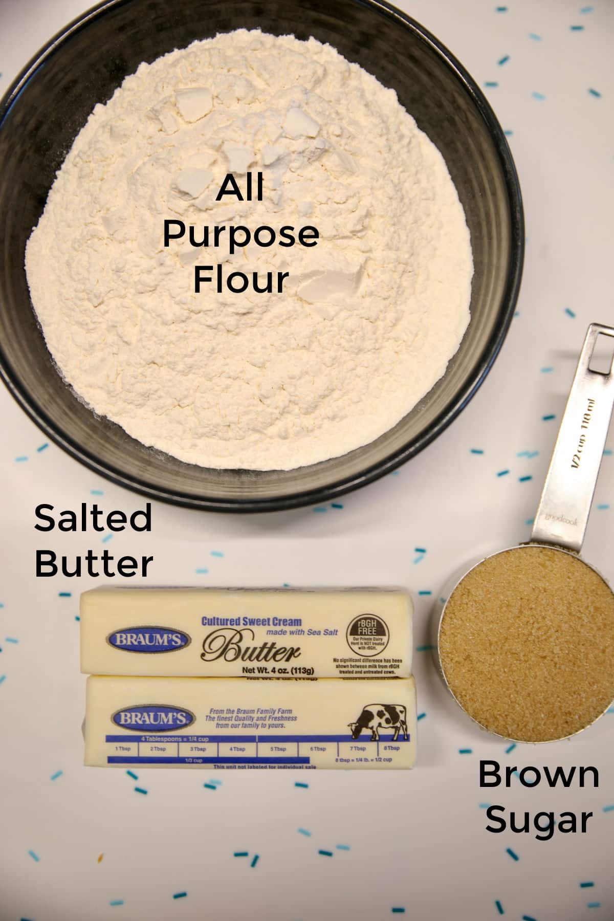 Bowl of flour, butter, brown sugar, text labels.