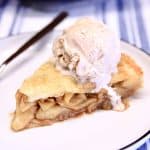 Slice of apple pie with ice cream.