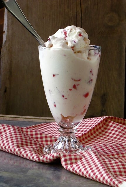 Strawberry Ice Cream in glass with spoon