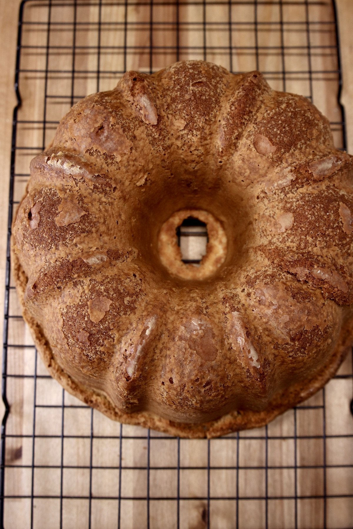 overhead of bundt cake cooling on wire rack