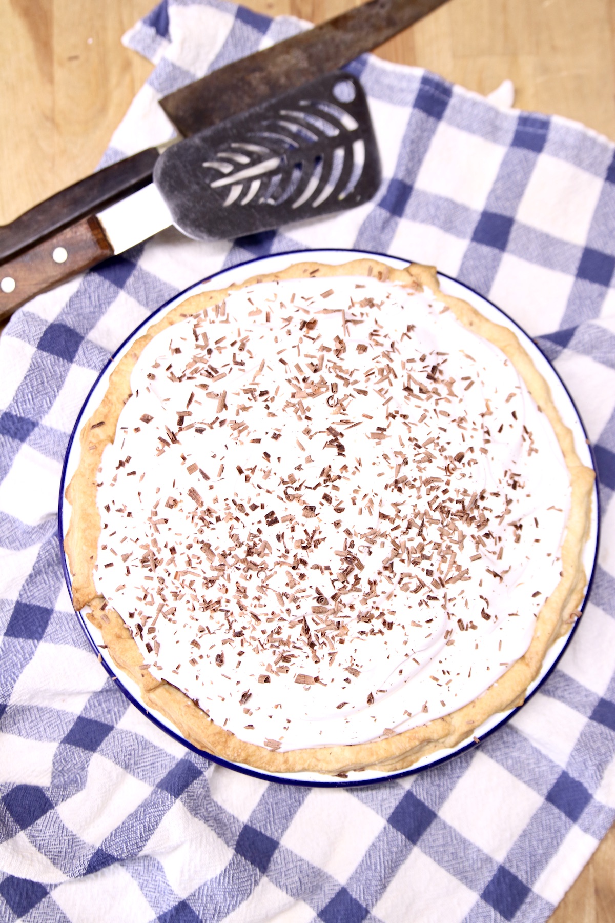 overhead of chocolate pie topped with whipped cream