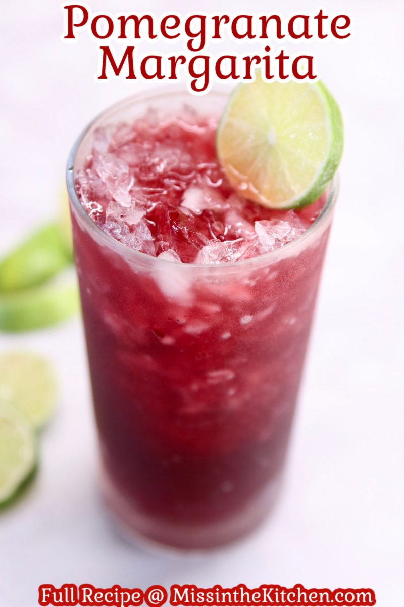 text overlay of pomegranate margarita with lime wheel