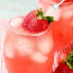 Stemless Wine Glass of Strawberry Wine Punch garnished with a fresh strawberry