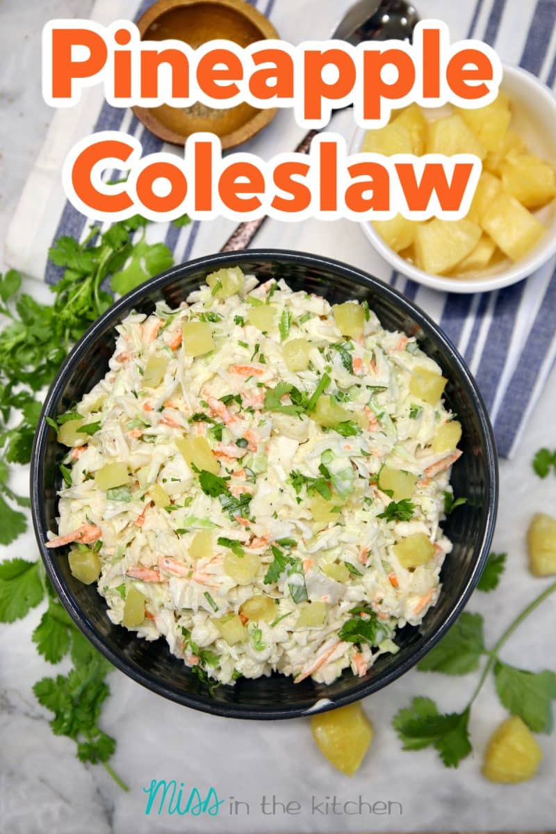 Pineapple coleslaw in a bowl with text overlay.