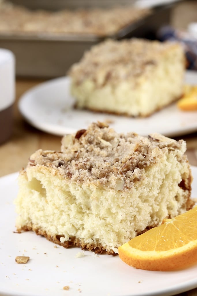 Almond Streusel Coffee Cake - 2 servings on plates with orange slices