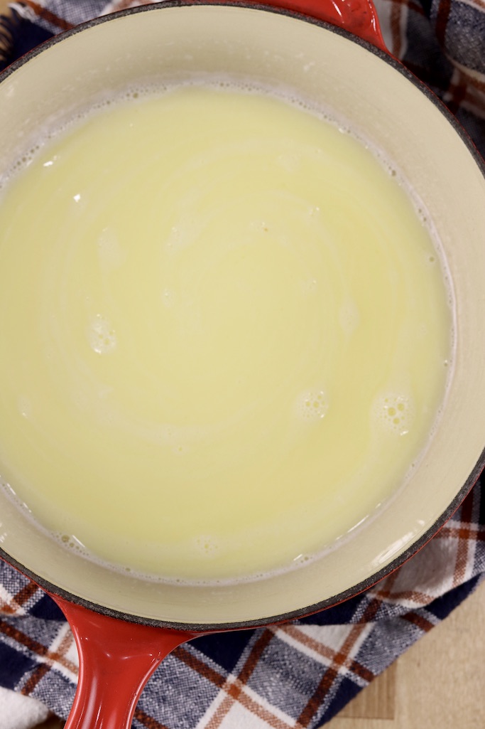 water, milk and melted butter in a saucepan