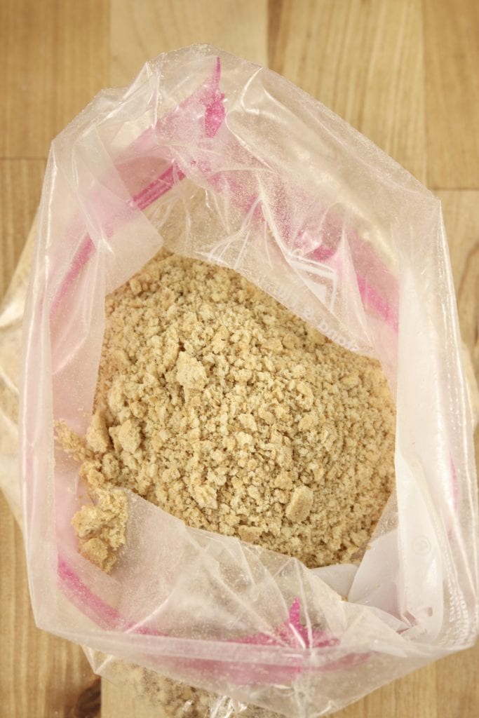 crushed graham crackers in a ziplock bag