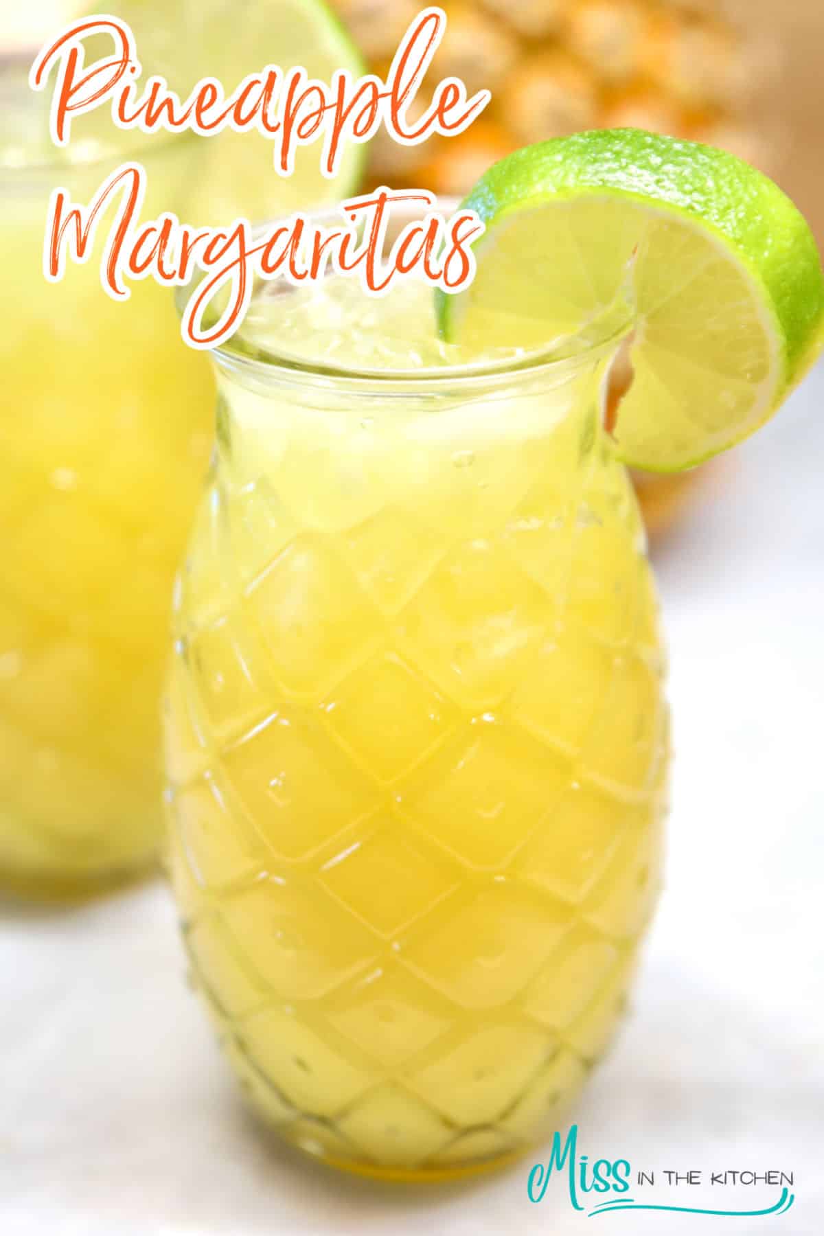 Easy Pineapple Margarita Recipe (Pitcher Cocktail) - Miss in the Kitchen