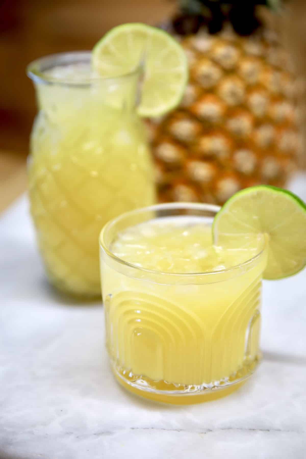 Pineapple margaritas in old fashioned glass, tiki glass.