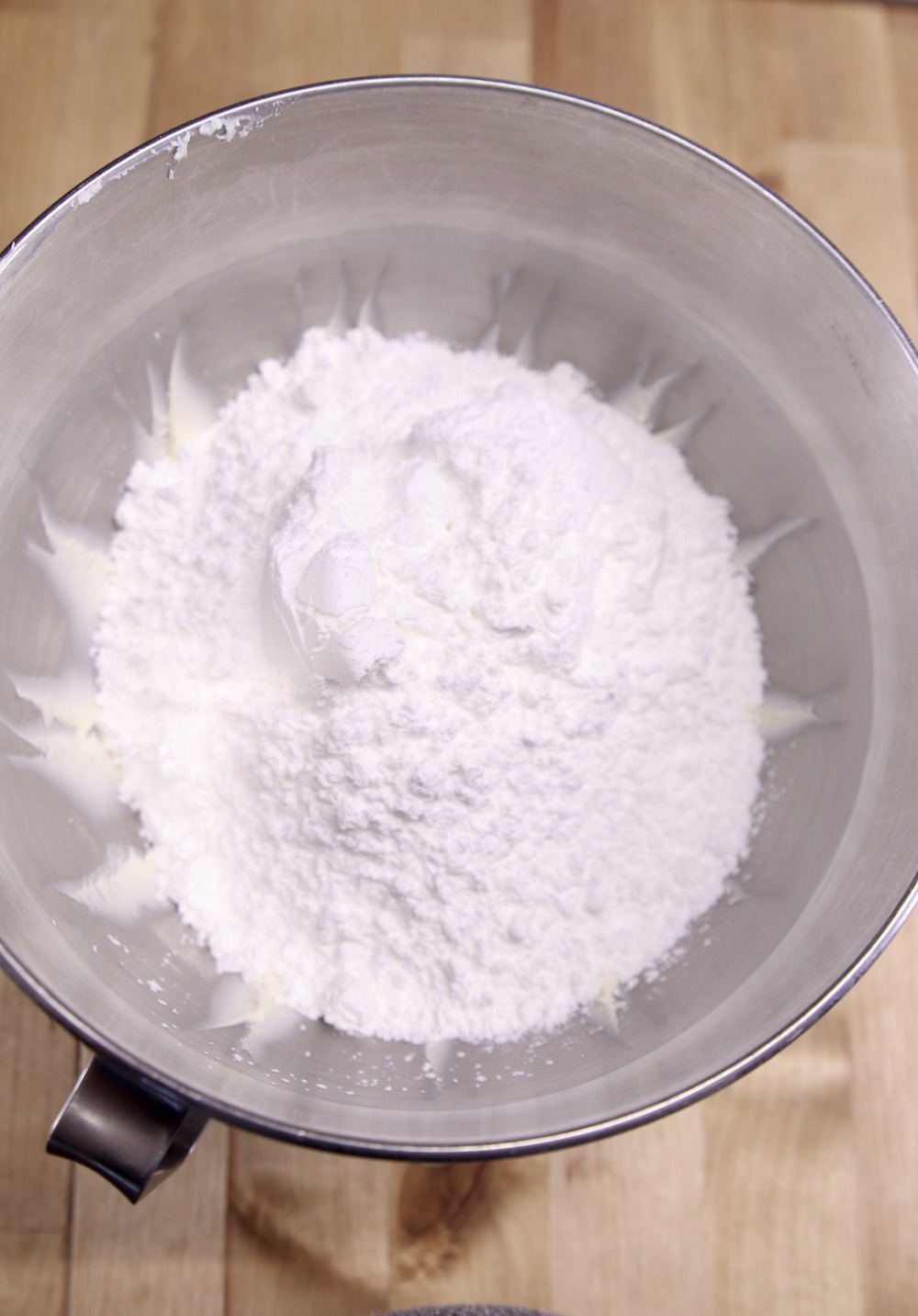 powdered sugar in a mixer bowl for icing