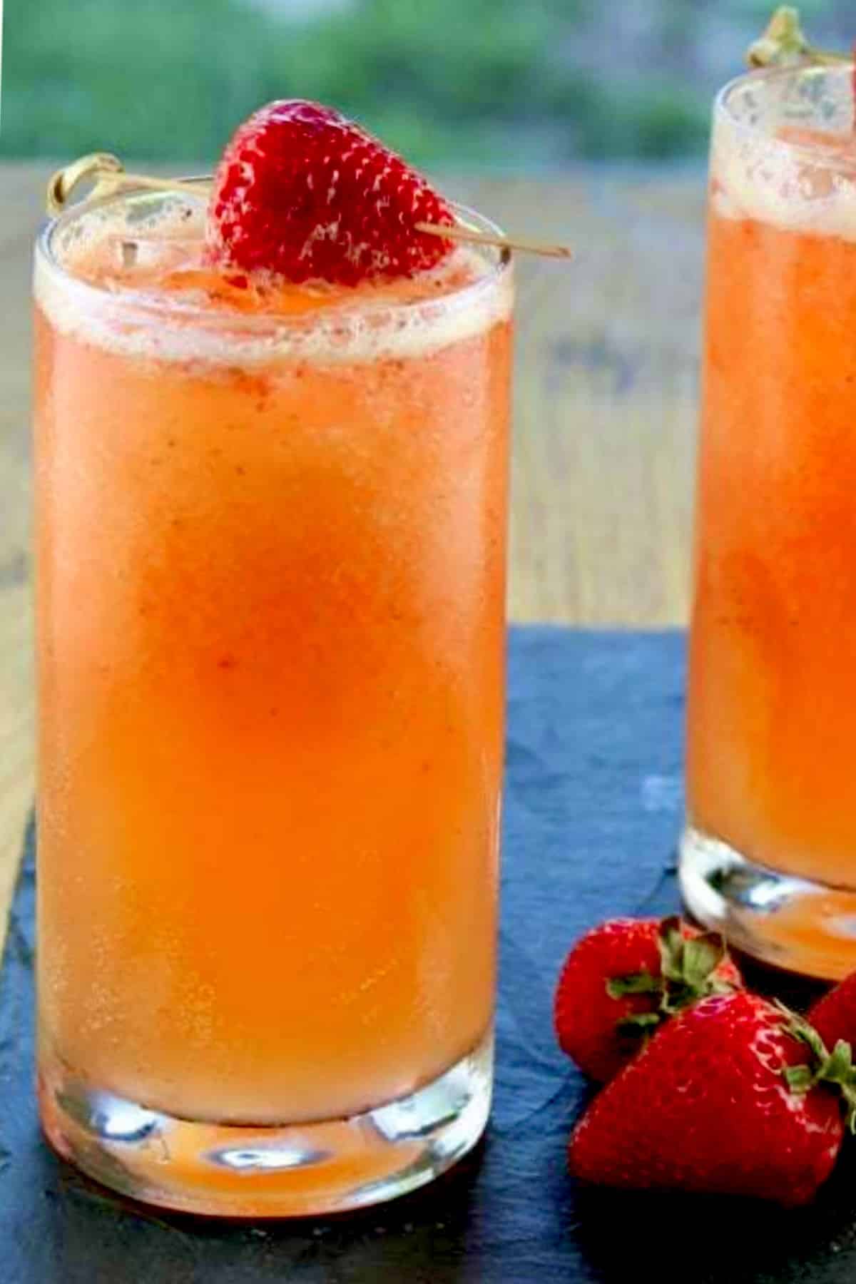 Glass with strawberry mango coolers. 