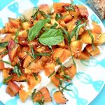 grilled peaches with basil and honey over cream cheese