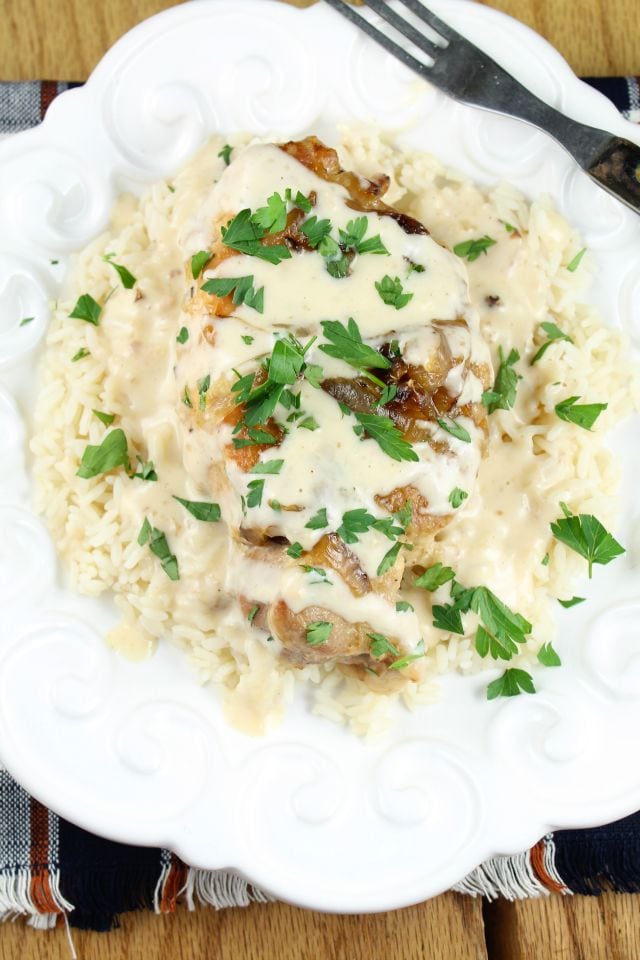 Slow Cooker Smothered Pork Chops with Sour Cream Sauce from Miss in the Kitchen