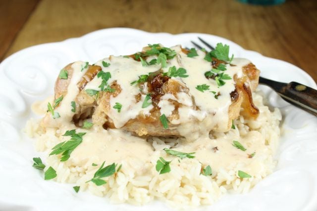 Slow Cooker Smothered Pork Chops with Sour Cream Sauce from missinthekitchen.com