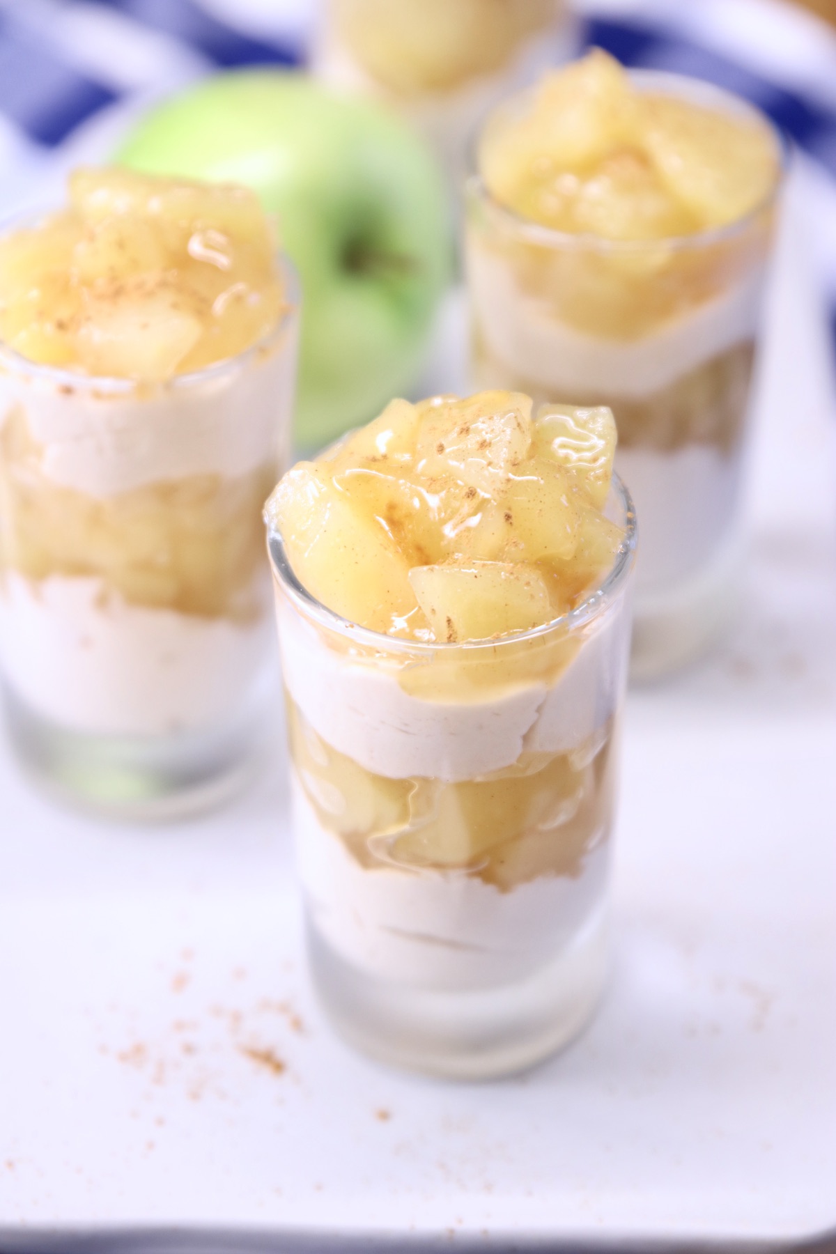 no bake cheesecakes in glasses with apple pie filling