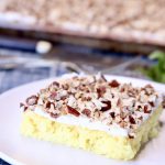 pineapple sheet cake with cream cheese icing and pecans