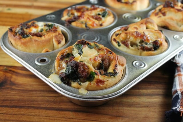 Zesty Sausage and Spinach Ranch Rolls baked in a muffin tin ~ missinthekitchen.com
