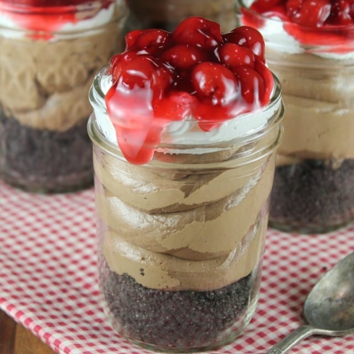 Chocolate cherry cheesecake in a jar