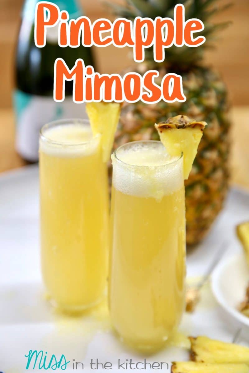 Pineapple Mimosa cocktails in stemless glasses. Text overlay.