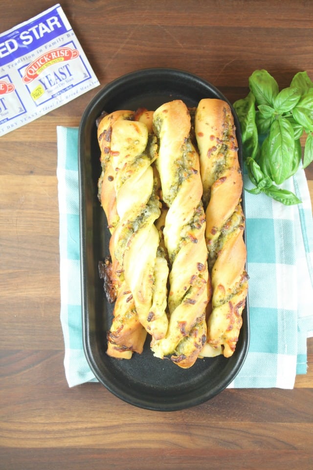 Try these Cheesy Pesto Breadsticks with any meal! Recipe from MissintheKitchen.com #ad