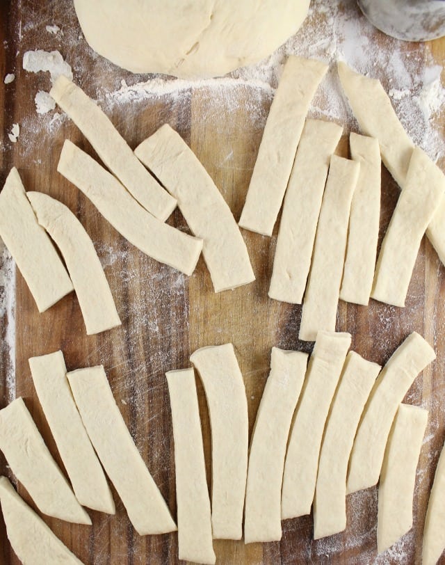Strips of Dough for Quick Rosemary Garlic Knots ~ MissintheKitchen.com