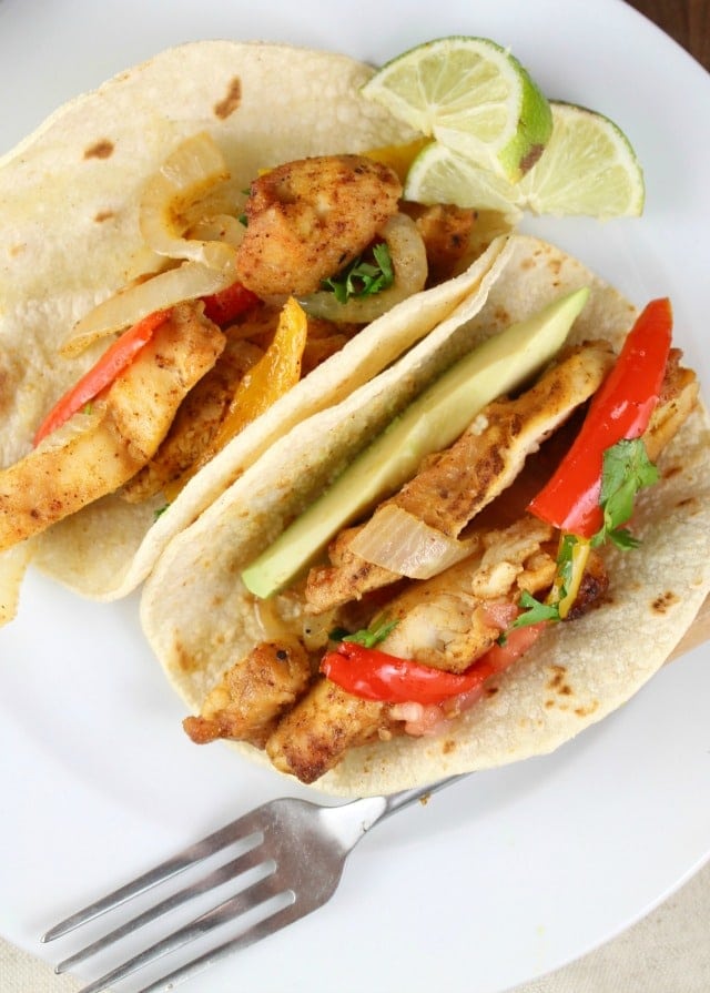 Sheet Pan Chicken Fajitas Recipe are a great meal for any weeknight from MissintheKitchen.com #GrilledandReady