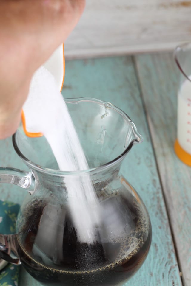 Adding sugar to coffee for mocha popsicles ~ MissintheKitchen.com #sponsored by Nielsen-Massey Vanillas