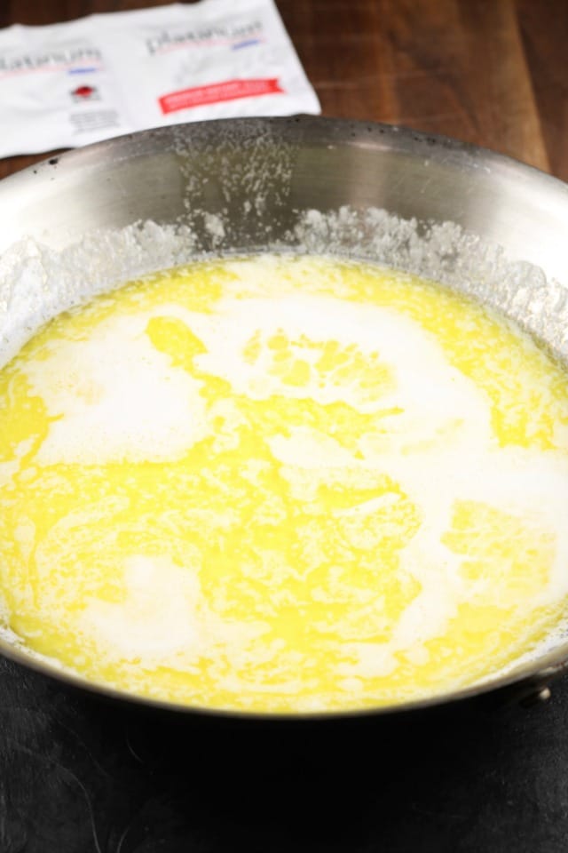 Melted Butter & Milk for White Cheddar Potato Rolls 