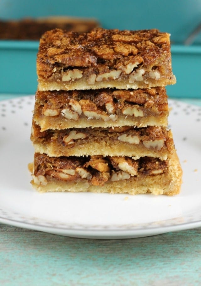Brown Sugar Pecan Pie Bars are a delicious dessert for any holiday or family celebration to feed a crowd. Recipe found at MissintheKitchen.com #holiday #christmas #AD @Walmart @Pillsbury #piebars #pecans 