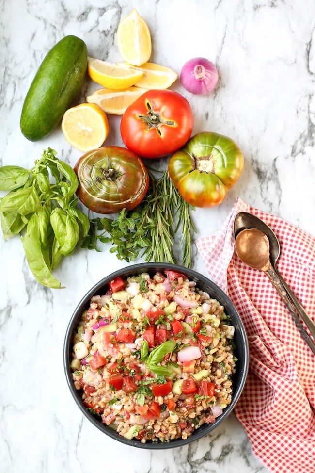 Greek Farro Salad with fresh heirloom tomatoes, cucumbers, onions and fresh herbs