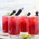 Easy Blackberry Margaritas garnished with blackberries and limes