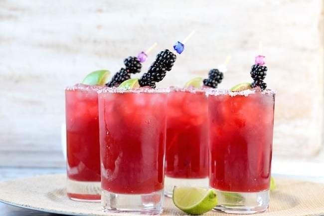 Easy Blackberry Margaritas garnished with blackberries and limes