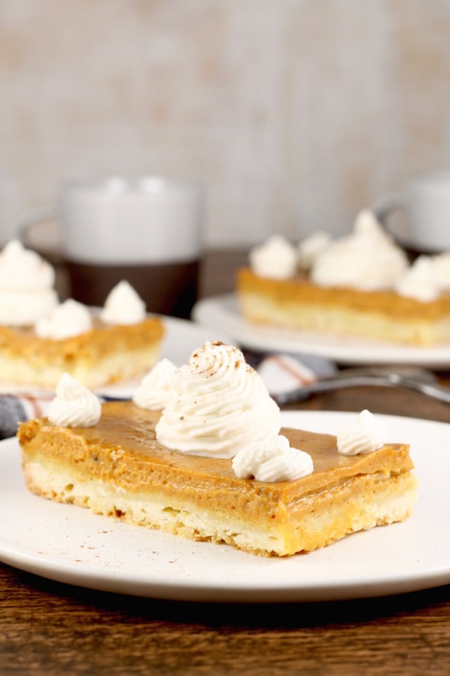 Easy Pumpkin Pie Bars with sweetened whipped cream