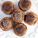 Mini Dove Cheesecakes with dulce de leche caramel and chocolate cheesecake