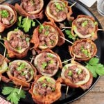 Loaded Potato Skins wrapped in bacon and stuffed with smoked roast beef and cheese