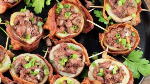 Loaded Potato Skins wrapped in bacon and stuffed with smoked roast beef and cheese