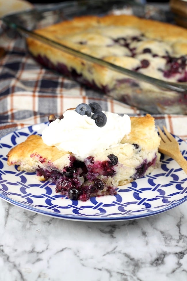 Easy Blueberry Cobbler served with whipped cream
