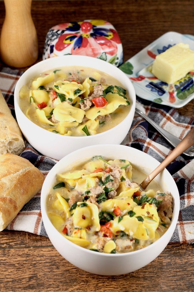 Easy Tortellini Soup with spinach served with crusty bread