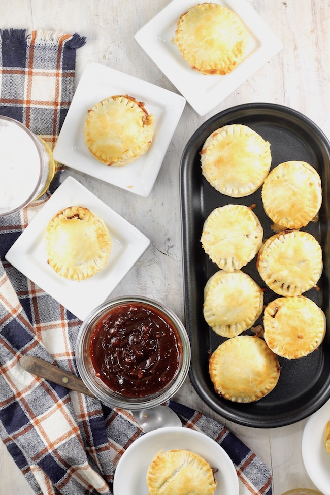 Mini Barbecue Meat Pies dipped in homemade barbecue sauce