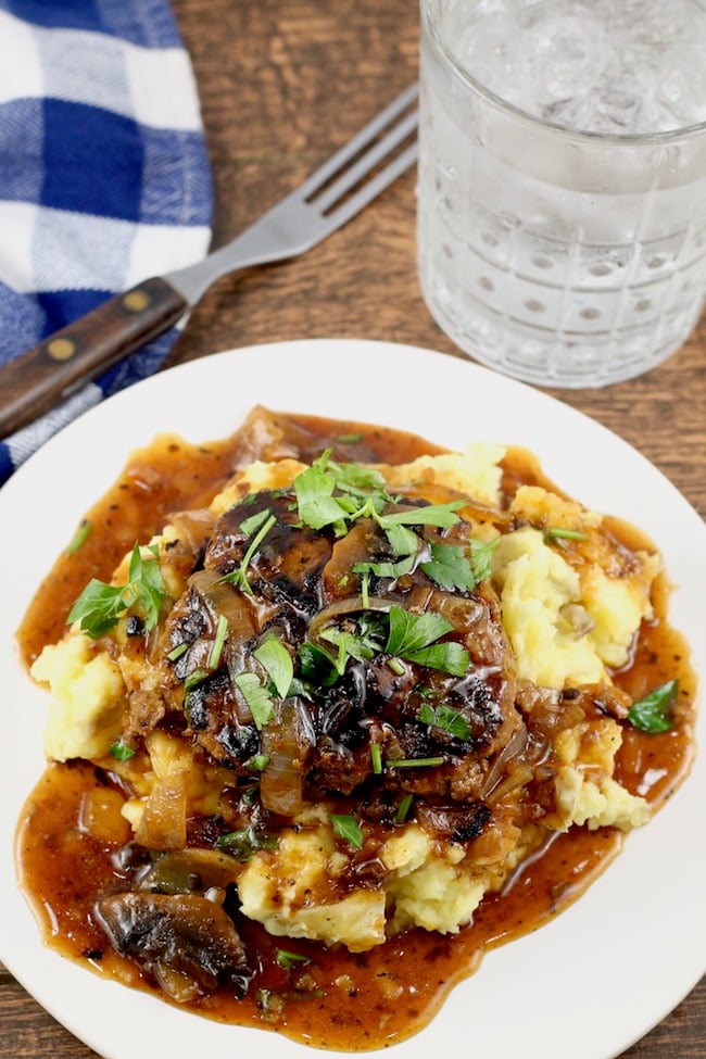 Easy Homemade Salisbury Steak Recipe with Mushroom and Onion Gravy ~ A hearty meal served over mashed potatoes. 