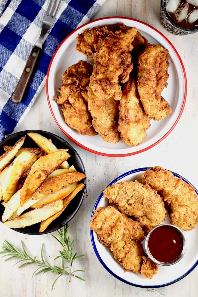 Fried Chicken Strips with fries and barbecue sauce